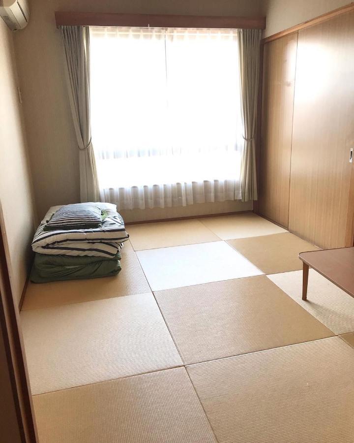 Guest House Yadokari Минамитита Экстерьер фото